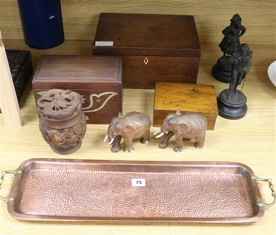 Three various boxes, a brass tray, a pair of carved elephants, a pair of Spelter figures and a carved pot